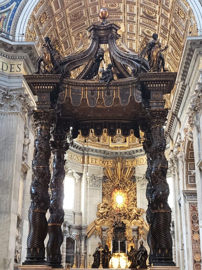 The massive bronze canopy (Baldachin) by Bernini standing over the high altar in St. Peter's Basilica.