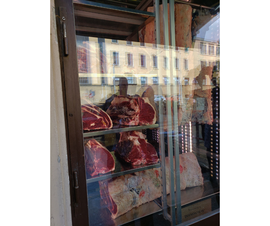 Steaks hanging in the window