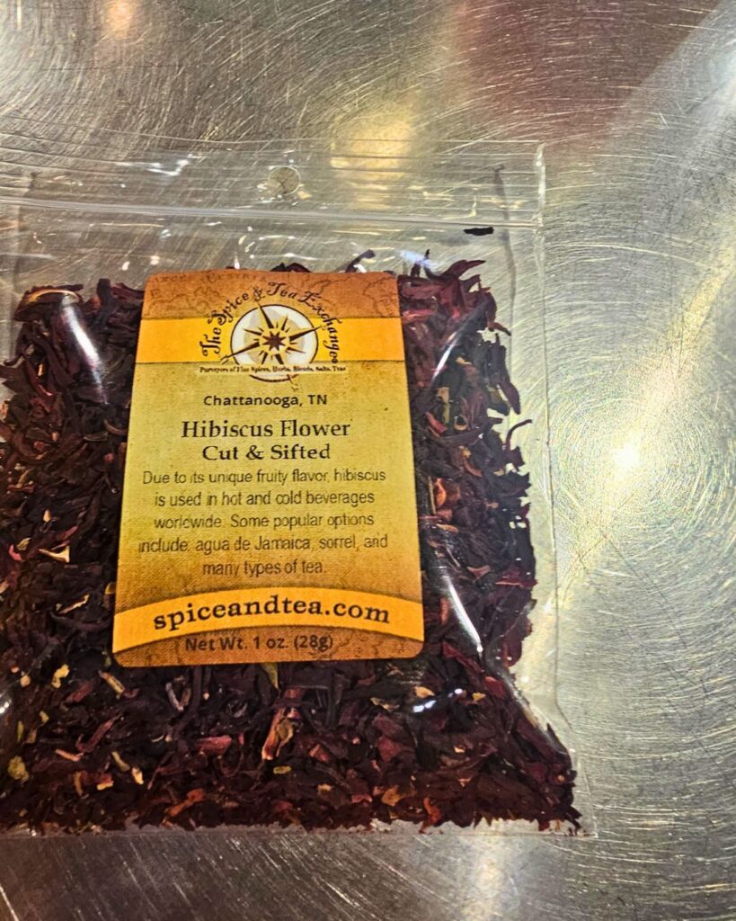 A small packet of dried hibiscus flowers from The Spice & Tea Exchange in Chattanooga.